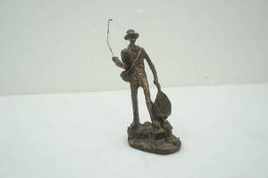 lot 124 image: fishing figurine