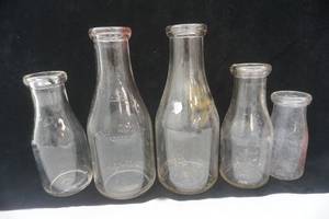 lot 206 image: Vintage glass bottle lot, milk bottles
