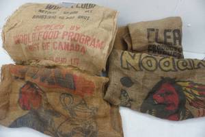lot 213 image: Lot of feed and seed sacks, Nodak