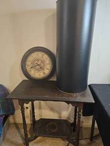 lot 156 image: Vintage Wooden Side Table with Shelf, Metal Storage Cylinder, and Antique Wall Clock