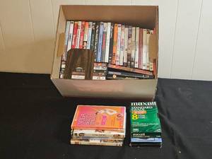 lot 205 image: Assorted DVD and VHS Collection with Yoga Fitness DVDs
