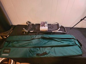 lot 212 image: Lot of Folding Hand Truck, Green Bag, and Rain Jacket