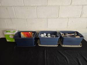 lot 402 image: Lot of Various Household Supplies - Batteries, Light Bulbs, and Shoe Care Products
