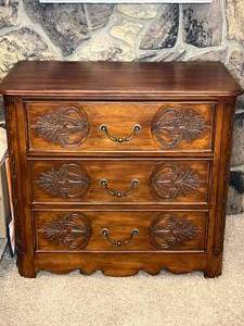 lot 76 image: Antique Wooden Dresser with Intricate Carvings