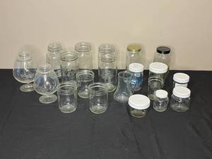 lot 111 image: Lot of Assorted Mason Jars, Glasswares, and Containers