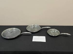 lot 134 image: HexClad Hybrid Cookware 3-Piece Set with Glass Lids