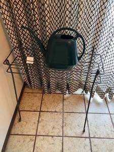 lot 144 image: Black Metal Plant Stand with Watering Can