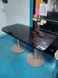 lot 51 image: Granite table top on custom steel base, powder coated