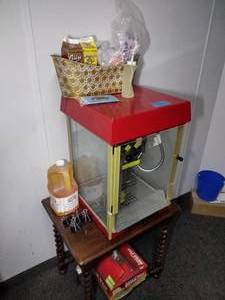 lot 92 image: Gold Medal FunPop 4 oz. Popcorn Machine, LouAna topping, Popcorn bags. Oval basket wcorn