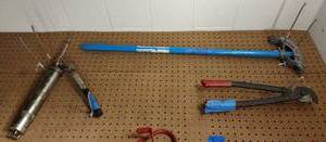 lot 204 image: Ideal 74-031 Conduit Bender, Klein Cable Cutter, and lever action grease gun