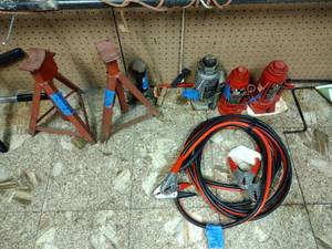 lot 207 image: (2) Hydraulic 12-ton Bottle Jacks. (1)  8-ton bottle jack. (2) Steel manual jack stands. Jumper Cables