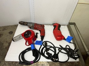 lot 199 image: 3 corded power tools Milwaukee Magnum Hammer Drill, Milwaukee Reversing Drill, MHT 750 Heat Gun