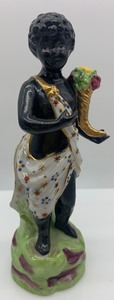 lot 32 image: Vintage MOTTAHEDEH&nbspAllegorical Africa Continent Porcelain Man Figurine