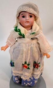 lot 13 image: Antique Vintage Diminutive GERMAN Bisque Doll with Markings and Floral Dress