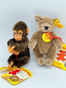 lot 209 image: STEIFF Mohair Jocko Monkey 002011 and Bear 020210 with Original Tags