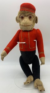 lot 82 image: Vintage German SCHUCO 1920s Bellhop YesNo Monkey