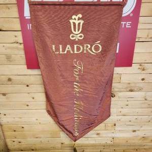 lot 146 image: Lladro Hanging Cloth Display