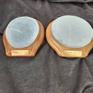 lot 147 image: Lot Of Five Lladro Items Four Lladro Society Bases And Plaque Stand