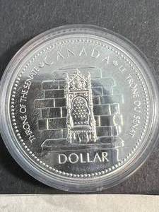 1977 CANADIAN 25 YEARS OF GOVERNMENT DOLLAR IN AIRTITE
