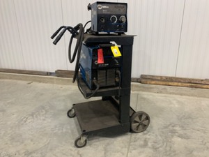 lot 195 image: Miller XMT304 CCCV Multi-Function Welder and Wire Feeder (parts or repair)