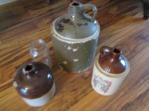 lot 105 image: Stoneware water jug grouping with a...