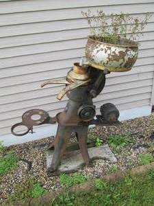 lot 142 image: Antique Cream separator outdoor yar...