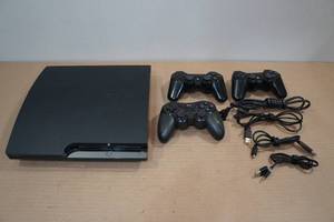 lot 9 image: PlayStation 3 Gaming Sytem with 3 Controllers