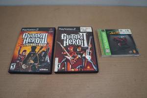 lot 16 image: PlayStation 2 Games Guitar Hero 2 & 3 with PlayStation JetMoto2