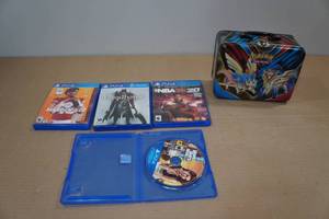lot 96 image: 4 PlayStation 4 Games with Pokemon Lunch Box