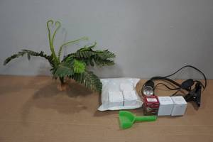 lot 134 image: Tank Light with 6 Replacement Bulbs and Dcor