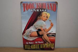 lot 200 image: Metal Garage Sign