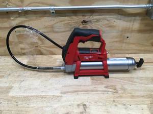 lot 14 image: Milwaukee 12V Grease Gun Model # 2446-20 (Tool Only)
