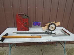 T-sqaures, gas cans, pipe vise & clamps. As shown.