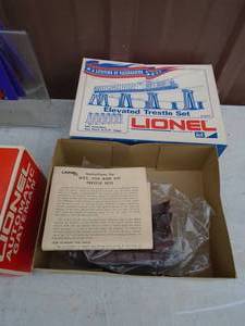 Assortment of model train accessories. As shown.