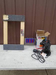 Sump pump. Looks nearly new & 4 wheel dolly. As shown,
