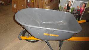 lot 103 image: True Temper 6 cu. ft. Wheelbarrow with Steel Handles and Flat Free Tire