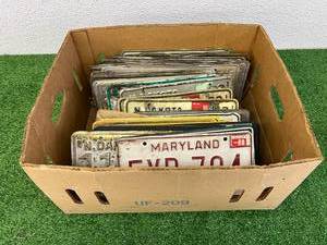 lot 101 image: Box of License Plates