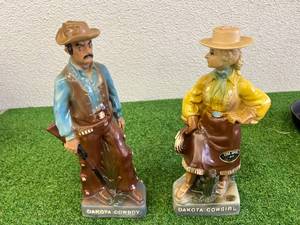 lot 111 image: Dakota Cowboy & Dakota Cowgirl Decanters