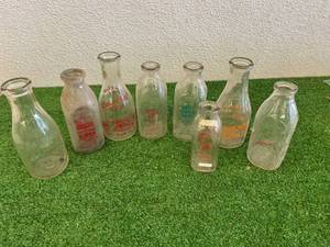 lot 139 image: Glass Milk Bottles - Wapheton ND, Cooperstown ND