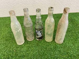 lot 249 image: Vintage Soda Bottles - Donald Duck Beverages, Duluth MN, Jamestown ND