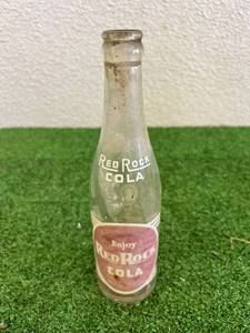 lot 257 image: Red Rock Cola Bottle Oakes ND