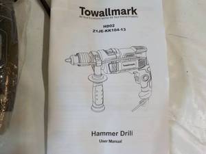 lot 16 image: Towallmark Hammer Drill new in box...