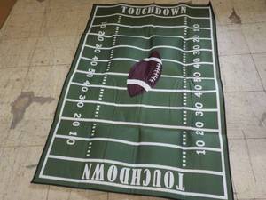 lot 77 image: 39 x 60 Touchdown Area Rug...
