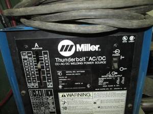 lot 26 image: Miller Thunderbolt ACDC welder along with Cutting Torches