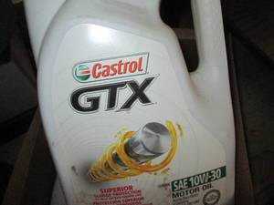 lot 57 image: Lot of Motor Oil - Castrol GTX and Shell FormulaShell SAE 10W-30
