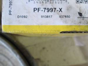 lot 59 image: Assorted Automotive Parts Lot including Brake Rotors, Brake Pads, and Metal Parts