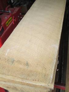 lot 106 image: Unfinished Rough Cut Lumber Planks