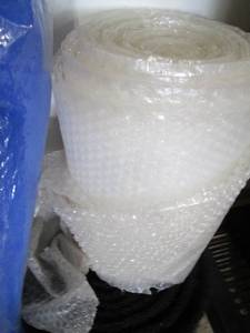 lot 186 image: Lot of Packing Materials Including Bubble Wrap, Fiberglass Air Filters