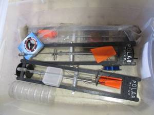 lot 205 image: Ice Fishing Equipment Lot Polar Tip-Ups, Ice Fly Reel, Maps & Propane Tank