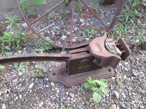 lot 253 image: Antique Wagon Wheel and Vintage Metal Tool